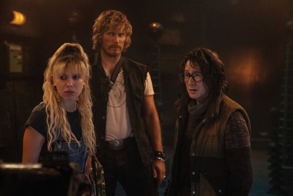 'The Electric State' Starring Millie Bobby Brown & Chris Pratt 3 The Electric State. (L to R) Michelle (Millie Bobby Brown) , Keats (Chris Pratt) and Dr. Amherst (Ke Huy Quan) in The Electric State. Photo Credit: Paul Abell, ©2024 Netflix, Inc.
