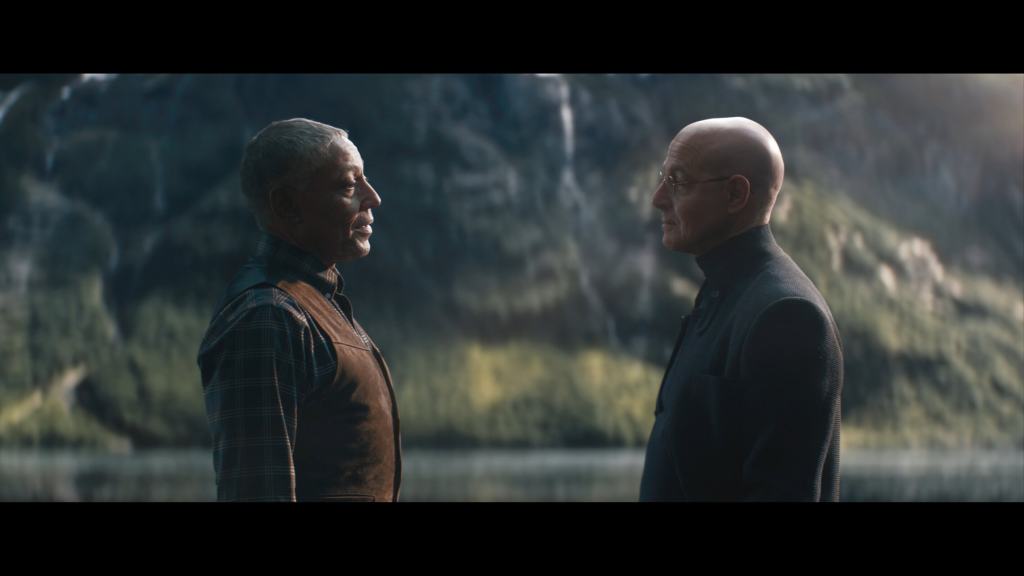'The Electric State' Starring Millie Bobby Brown & Chris Pratt 5 The Electric State. (L to R) Colonel Bradbury (Giancarlo Esposito) and Ethan Skate (Stanley Tucci) in The Electric State. ™/© 2024 Netflix. Used with permission