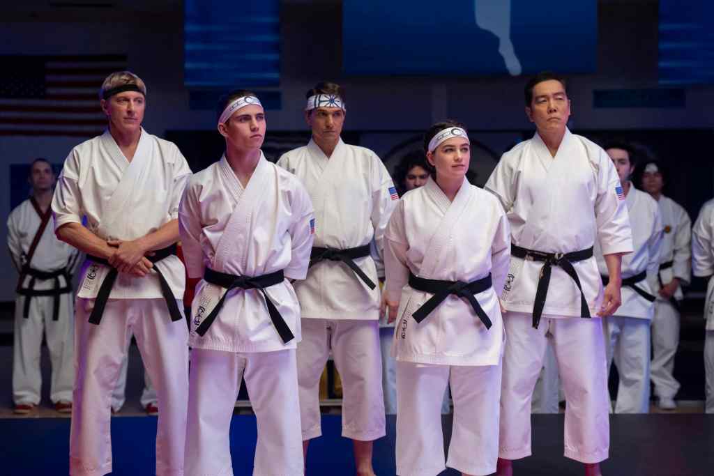 'Cobra Kai' Series Finale 2 Cobra Kai. (L to R) William Zabka as Johnny Lawrence, Tanner Buchanan as Robby Keene, Ralph Macchio as Daniel LaRusso, Mary Mouser as Samantha LaRusso, Yuji Okumoto as Chozen in Cobra Kai. Cr. Curtis Bonds Baker/Netflix © 2024